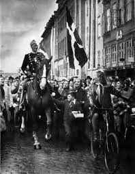 King kristian riding through the streets.jpg